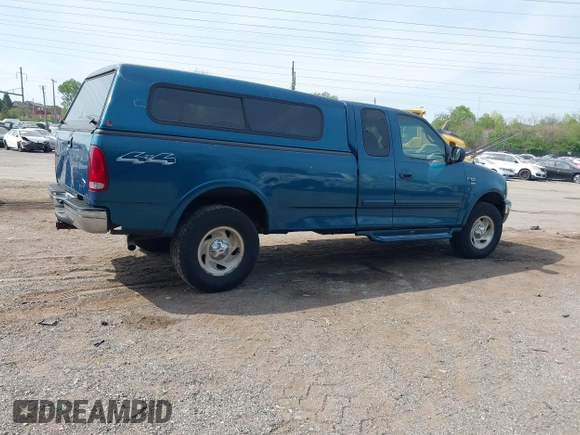 2000 Ford F-150 XL with VIN 1FTRX18W2YNC19493, listed as a IAAI auction lot 42127210 with 115,052 mi miles. Bid and sale history available at carsss.com. Image 4.