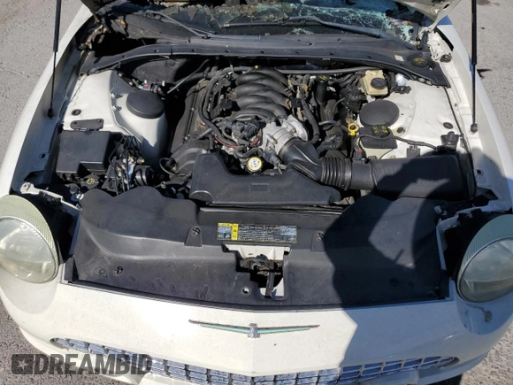 2003 Ford Thunderbird Deluxe z VIN 1FAHP60A83Y113992, wystawiony jako Copart lot #77277574 z przebiegiem Nie podano mil oraz Nie do naprawy • Non repairable. Historia ofert i sprzedaży dostępna na DreamBid. Obrazek 11.