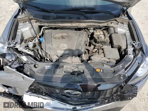 2015 Mazda CX-5 Sport with VIN JM3KE2BE4F0533273, listed as a Copart auction lot 60307795 with 120,484 mi miles and Salvage title. Bid and sale history available at DreamBid. Image 12.