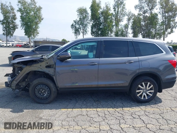2020 Honda Pilot EX-L z VIN 5FNYF6H50LB047202, wystawiony jako IAAI lot #42117776 z przebiegiem 119 726 mil mil oraz . Historia ofert i sprzedaży dostępna na DreamBid. Obrazek 15.
