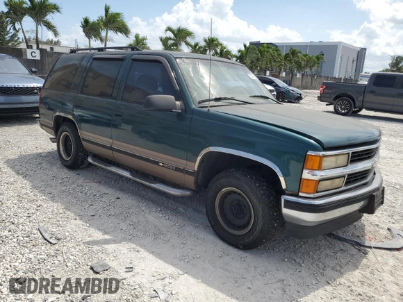 1995 Chevrolet Tahoe z VIN 1GNEC13K1SJ439759, wystawiony jako Copart lot #57784845 z przebiegiem 190 566 mil mil oraz Czysty tytuł • Clean title. Historia ofert i sprzedaży dostępna na DreamBid. Obrazek 4.