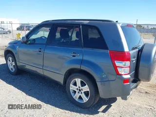 2006 Suzuki Grand Vitara Luxury z VIN JS3TE947164104381, wystawiony jako IAAI lot #41665094 z przebiegiem 145 874 mil mil oraz . Historia ofert i sprzedaży dostępna na DreamBid. Obrazek 3.