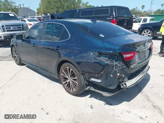 2020 Toyota Camry SE with VIN 4T1G11AK5LU500066, listed as a IAAI auction lot 42000886 with 99,153 mi miles. Bid and sale history available at carsss.com. Image 3.