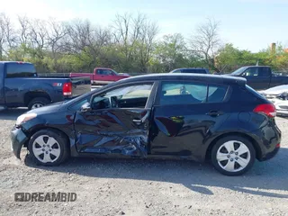 2016 Kia Forte 5-Door LX with VIN KNAFK5A86G5597042, listed as a IAAI auction lot 42032937 with 145,137 mi miles. Bid and sale history available at carsss.com. Image 15.