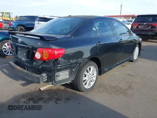 2010 Toyota Corolla with VIN 1NXBU4EE2AZ299148, listed as a IAAI auction lot 41884899 with 303,174 mi miles. Bid and sale history available at carsss.com. Image 4.