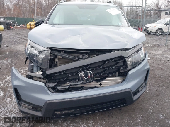 2022 Honda Passport Elite z VIN 5FNYF8H06NB015583, wystawiony jako IAAI lot #41633925 z przebiegiem 49 738 mil mil oraz . Historia ofert i sprzedaży dostępna na DreamBid. Obrazek 6.