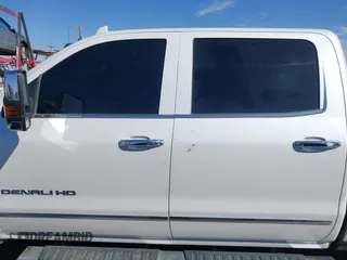 2019 GMC Sierra 2500HD Denali with VIN 1GT12SEY8KF139611, listed as a IAAI auction lot 41641028 with 69,776 mi miles. Bid and sale history available at carsss.com. Image 14.