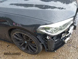 2018 BMW 5 Series M550i xDrive with VIN WBAJB9C5XJB286923, listed as a IAAI auction lot 42527301 with 76,923 mi miles and . Bid and sale history available at DreamBid. Image 20.
