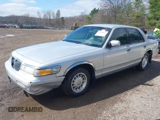1997 Mercury Grand Marquis LS with VIN 2MELM75W3VX717801, listed as a IAAI auction lot 41920075 with 173,730 mi miles and . Bid and sale history available at DreamBid. Image 20.