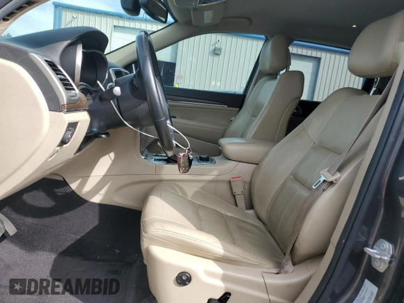 2016 Jeep Grand Cherokee Limited with VIN 1C4RJFBG3GC312873, listed as a Copart auction lot 56943705 with 134,633 mi miles and Salvage title. Bid and sale history available at DreamBid. Image 7.
