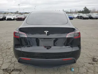 2025 Tesla Model Y Long Range with VIN 7SAYGDEE6SF308226, listed as a Copart auction lot 48006865 with 2,291 mi miles and Salvage Title. Bid and sale history available at carsss.com. Image 6.