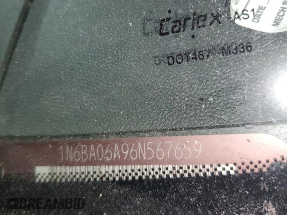 2006 Nissan Titan SE with VIN 1N6BA06A96N567659, listed as a Copart auction lot 61928495 with 190,594 mi miles and Salvage title. Bid and sale history available at DreamBid. Image 12.