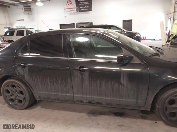 2011 Ford Fusion SE with VIN 3FAHP0HA8BR229076, listed as a IAAI auction lot 41413525 with 221,572 mi miles. Bid and sale history available at carsss.com. Image 13.