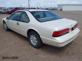 1995 Ford Thunderbird LX with VIN 1FALP62W1SH168074, listed as a IAAI auction lot 41995575 with 232,742 mi miles. Bid and sale history available at carsss.com. Image 3.