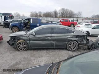 2014 Toyota Avalon Limited with VIN 4T1BK1EB0EU084433, listed as a IAAI auction lot 41434826 with 166,964 mi miles. Bid and sale history available at carsss.com. Image 15.
