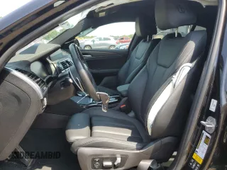 2021 BMW X4 xDrive30i with VIN 5UX2V1C09M9E03411, listed as a Copart auction lot 62078545 with 49,101 mi miles and Salvage title. Bid and sale history available at DreamBid. Image 7.