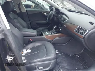 2016 Audi A7 3.0 Premium Plus with VIN WAUWGAFC0GN006470, listed as a IAAI auction lot 41638615 with 104,040 mi miles. Bid and sale history available at carsss.com. Image 5.