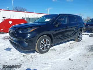 2023 Toyota Highlander L with VIN 5TDKDRBH8PS042797, listed as a IAAI auction lot 41599048 with 26,430 mi miles. Bid and sale history available at carsss.com. Image 2.