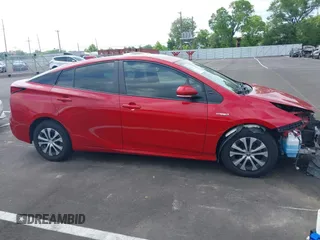 2021 Toyota Prius LE with VIN JTDL9MFU0M3029880, listed as a IAAI auction lot 42450003 with 91,558 mi miles and . Bid and sale history available at DreamBid. Image 13.
