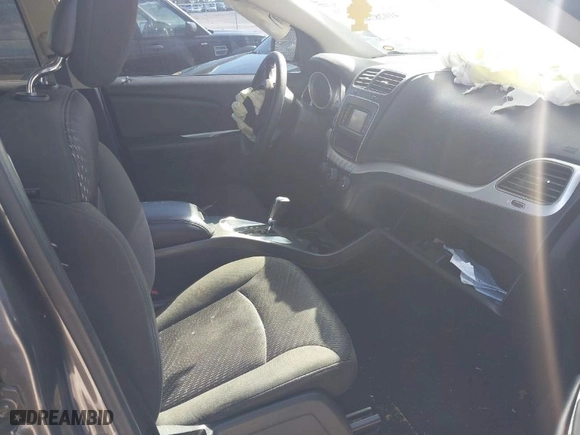 2019 Dodge Journey SE Value Pkg with VIN 3C4PDCAB7KT747315, listed as a IAAI auction lot 41028740 with 143,469 mi miles. Bid and sale history available at carsss.com. Image 5.