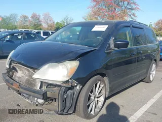 2007 Honda Odyssey EX-L with VIN 5FNRL386X7B128430, listed as a IAAI auction lot 42146089 with 231,059 mi miles and . Bid and sale history available at DreamBid. Image 2.