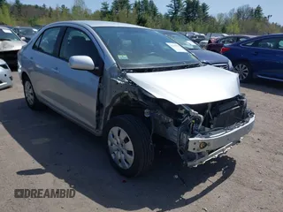 2009 Toyota Yaris with VIN JTDBT903X91300439, listed as a IAAI auction lot 42105998 with 195,880 mi miles. Bid and sale history available at carsss.com. Image 1.
