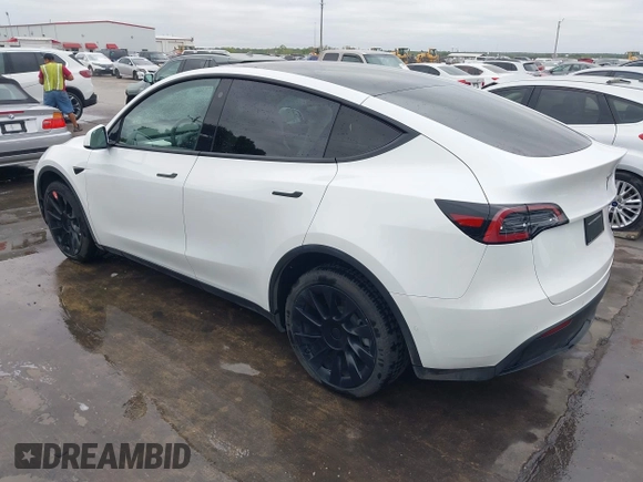 2022 Tesla Model Y Long Range z VIN 7SAYGDEE2NF420882, wystawiony jako IAAI lot #42023642 z przebiegiem 19 783 mil mil oraz . Historia ofert i sprzedaży dostępna na DreamBid. Obrazek 3.