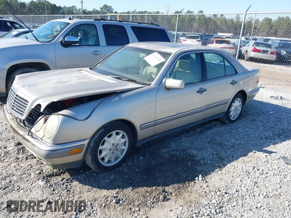 1997 Mercedes-Benz E-Class with VIN WDBJF55F4VA405680, listed as a IAAI auction lot 41462478 with 352,480 mi miles. Bid and sale history available at carsss.com. Image 2.