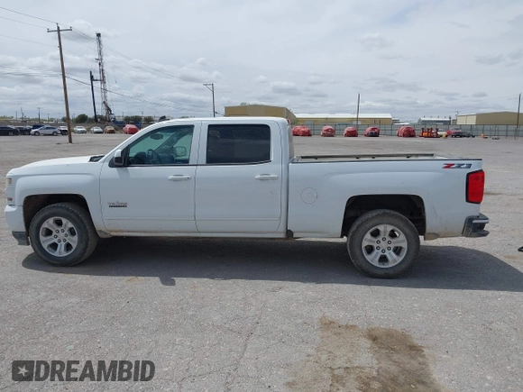 2018 Chevrolet Silverado 1500 LT with VIN 1GCUKREC5JF133998, listed as a IAAI auction lot 41880805 with 166,258 mi miles and . Bid and sale history available at DreamBid. Image 14.