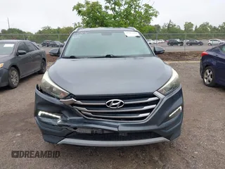 2017 Hyundai Tucson Value z VIN KM8J33A28HU399978, wystawiony jako IAAI lot #41987370 z przebiegiem 96 958 mil mil oraz . Historia ofert i sprzedaży dostępna na DreamBid. Obrazek 13.