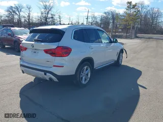 2019 BMW X3 xDrive30i with VIN 5UXTR9C53KLE14519, listed as a IAAI auction lot 41747651 with 141,273 mi miles. Bid and sale history available at carsss.com. Image 4.