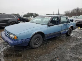 1991 Oldsmobile Delta z VIN 1G3HN54C3M1807067, wystawiony jako Copart lot #46126225 z przebiegiem 192 687 mil mil oraz Szkody całkowita. Historia ofert i sprzedaży dostępna na DreamBid. Obrazek 1.