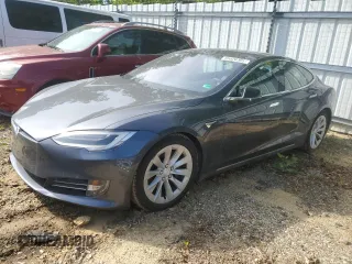 2017 Tesla Model S 60 с VIN 5YJSA1E14HF218159, выставлен на аукционе Copart как лот 55020305 с пробегом 81 642 миль миль и Списание • Salvage title. История ставок и продаж доступна на DreamBid. Изображение 1.