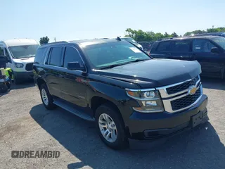 2015 Chevrolet Tahoe LT z VIN 1GNSKBKC4FR555079, wystawiony jako IAAI lot #42399745 z przebiegiem 143 410 mil mil oraz . Historia ofert i sprzedaży dostępna na DreamBid. Obrazek 1.