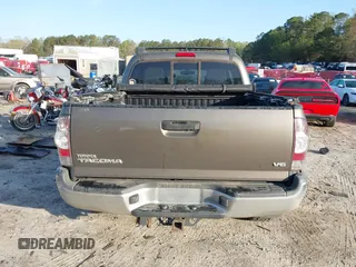 2014 Toyota Tacoma with VIN 3TMLU4EN3EM163162, listed as a IAAI auction lot 41930392 with 167,368 mi miles and . Bid and sale history available at DreamBid. Image 17.