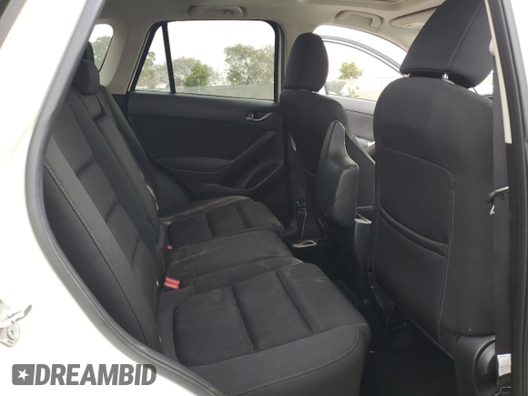 2016 Mazda CX-5 Touring with VIN JM3KE2CY5G0838663, listed as a Copart auction lot 47658065 with 51,470 mi miles and Salvage Title. Bid and sale history available at carsss.com. Image 11.