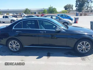2015 Mercedes-Benz C 300 Luxury with VIN 55SWF4KB2FU047571, listed as a IAAI auction lot 42201288 with 124,678 mi miles and . Bid and sale history available at carsss.com. Image 13.