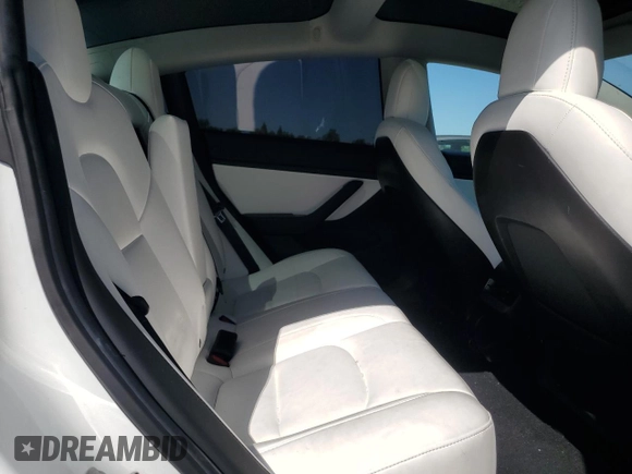 2020 Tesla Model 3 Standard Range Plus z VIN 5YJ3E1EA5LF741093, wystawiony jako Copart lot #52891695 z przebiegiem 59 168 mil mil oraz Szkoda całkowita • Salvage title. Historia ofert i sprzedaży dostępna na DreamBid. Obrazek 10.