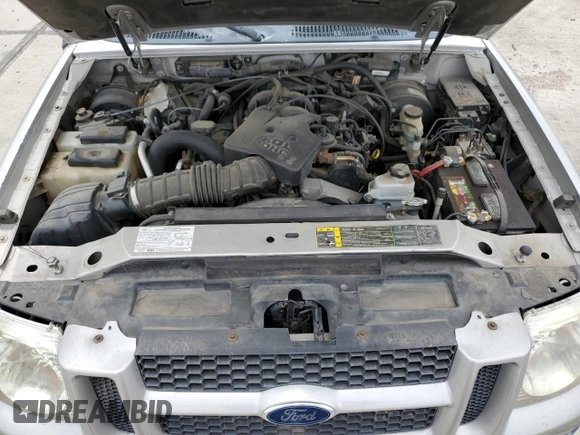 2005 Ford Explorer Sport Trac XLS z VIN 1FMZU77K85UB40868, wystawiony jako Copart lot #59041105 z przebiegiem 213 338 mil mil oraz Szkoda całkowita • Salvage title. Historia ofert i sprzedaży dostępna na DreamBid. Obrazek 11.