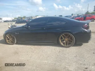 2015 BMW M4 with VIN WBS3R9C57FK332862, listed as a Copart auction lot 59395104 with 63,112 mi miles and Salvage Title. Bid and sale history available at carsss.com. Image 2.