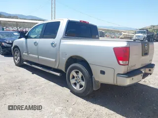 2007 Nissan Titan XE with VIN 1N6AA07A87N214499, listed as a IAAI auction lot 41965882 with 140,693 mi miles and . Bid and sale history available at DreamBid. Image 3.