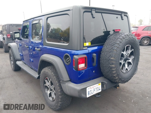 2018 Jeep Wrangler Unlimited Sport S with VIN 1C4HJXDG7JW235946, listed as a IAAI auction lot 42473146 with 37,973 mi miles and . Bid and sale history available at DreamBid. Image 3.