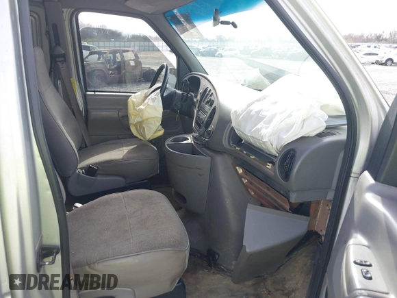 1998 Ford Econoline Cargo with VIN 1FTRE1428WHB30628, listed as a IAAI auction lot 41706164 with 153,223 mi miles. Bid and sale history available at carsss.com. Image 5.