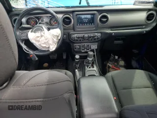 2020 Jeep Gladiator Sport S с VIN 1C6HJTAG5LL153853, выставлен на аукционе Copart как лот 56023925 с пробегом 31 143 миль миль и Списание • Salvage title. История ставок и продаж доступна на DreamBid. Изображение 8.