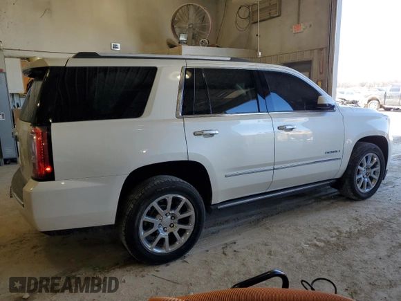 2015 GMC Yukon Denali with VIN 1GKS2CKJ7FR266750, listed as a Copart auction lot 47882125 with 121,705 mi miles and Salvage Title. Bid and sale history available at carsss.com. Image 3.