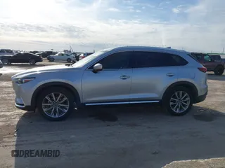 2020 Mazda CX-9 Grand Touring z VIN JM3TCADY7L0416696, wystawiony jako IAAI lot #41310183 z przebiegiem 105 754 mil mil oraz . Historia ofert i sprzedaży dostępna na DreamBid. Obrazek 14.