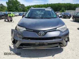 2016 Toyota RAV4 Limited z VIN JTMDFREVXGJ076533, wystawiony jako Copart lot #57480995 z przebiegiem 124 626 mil mil oraz Szkoda całkowita • Salvage title. Historia ofert i sprzedaży dostępna na DreamBid. Obrazek 5.