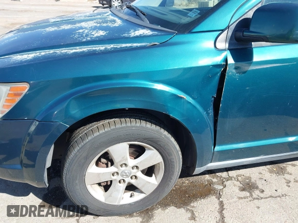 2009 Dodge Journey SXT with VIN 3D4GG57V09T170094, listed as a IAAI auction lot 41867577 with 122,831 mi miles. Bid and sale history available at carsss.com. Image 12.