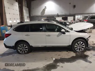 2019 Subaru Outback Touring with VIN 4S4BSATC4K3357564, listed as a IAAI auction lot 41277603 with 28,509 mi miles and . Bid and sale history available at DreamBid. Image 12.