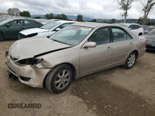 2005 Toyota Camry LE with VIN 4T1BF30K65U082774, listed as a Copart auction lot 52586035 with 119,968 mi miles and Clean Title. Bid and sale history available at DreamBid. Image 1.